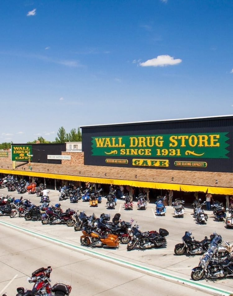 External view of Wall Drug Store Cafe during The Sturgis Rally with motorcycles in most parking spots